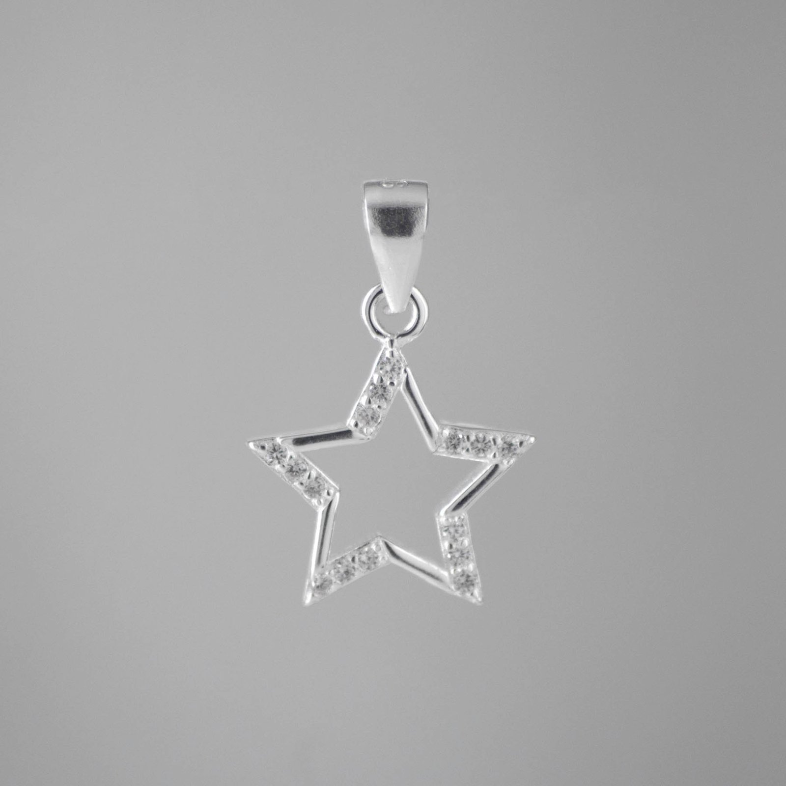 DIJE SILUETA ESTRELLA MICROCIRCONES