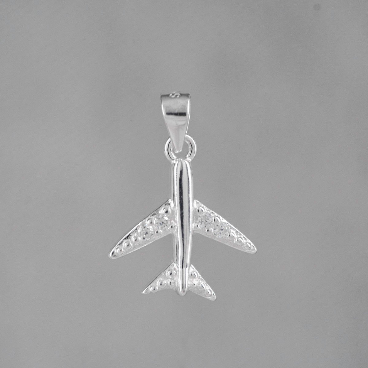 DIJE AVION ALAS CIRCONES PEQUEÑO